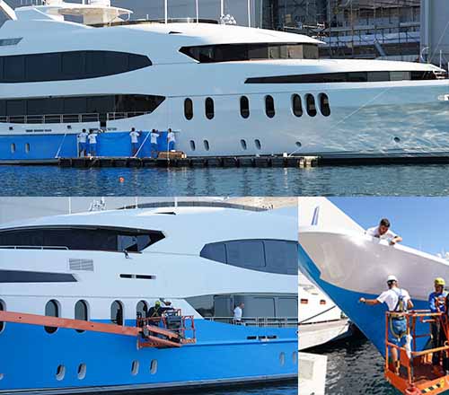 60m Trinity superyacht full hull wrapped in blue vinyl by LuxWrap — at the time the largest in-water hull wrap ever completed