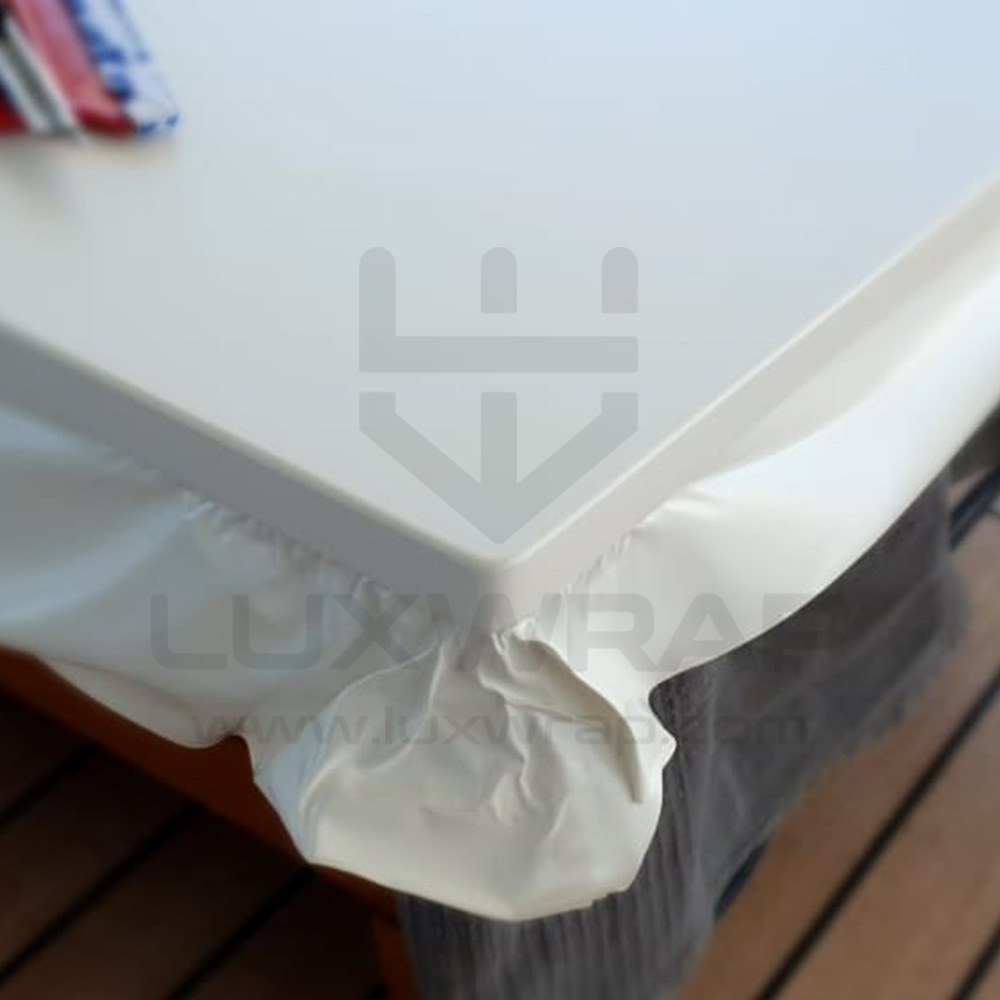 LuxWrap team wrapping deckhead panels in satin-white vinyl on a 57m Benetti — yacht remained in service throughout