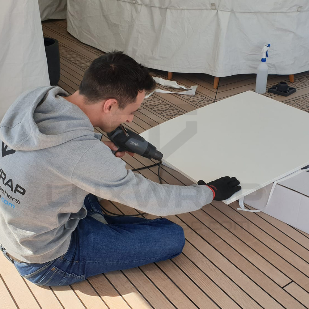 Finished satin-white vinyl deckheads on a 57m Benetti superyacht — 280m² wrapped by LuxWrap with no painting downtime
