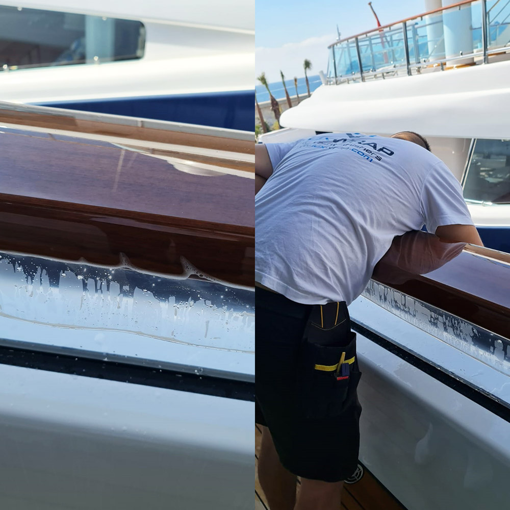 LuxWrap installer wrapping over 100 metres of wooden cap rails on a 96m Feadship — self-healing hydrophobic PPF installation